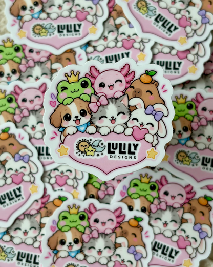 A close-up pile of cartoon animal stickers featuring cute dogs, cats, and frogs with hearts and the text 'LUZY DESIGNS' on a pink heart-shaped badge.