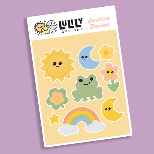 Sheet of colorful stickers with cartoon sun, moon, flowers, and frog on a purple background